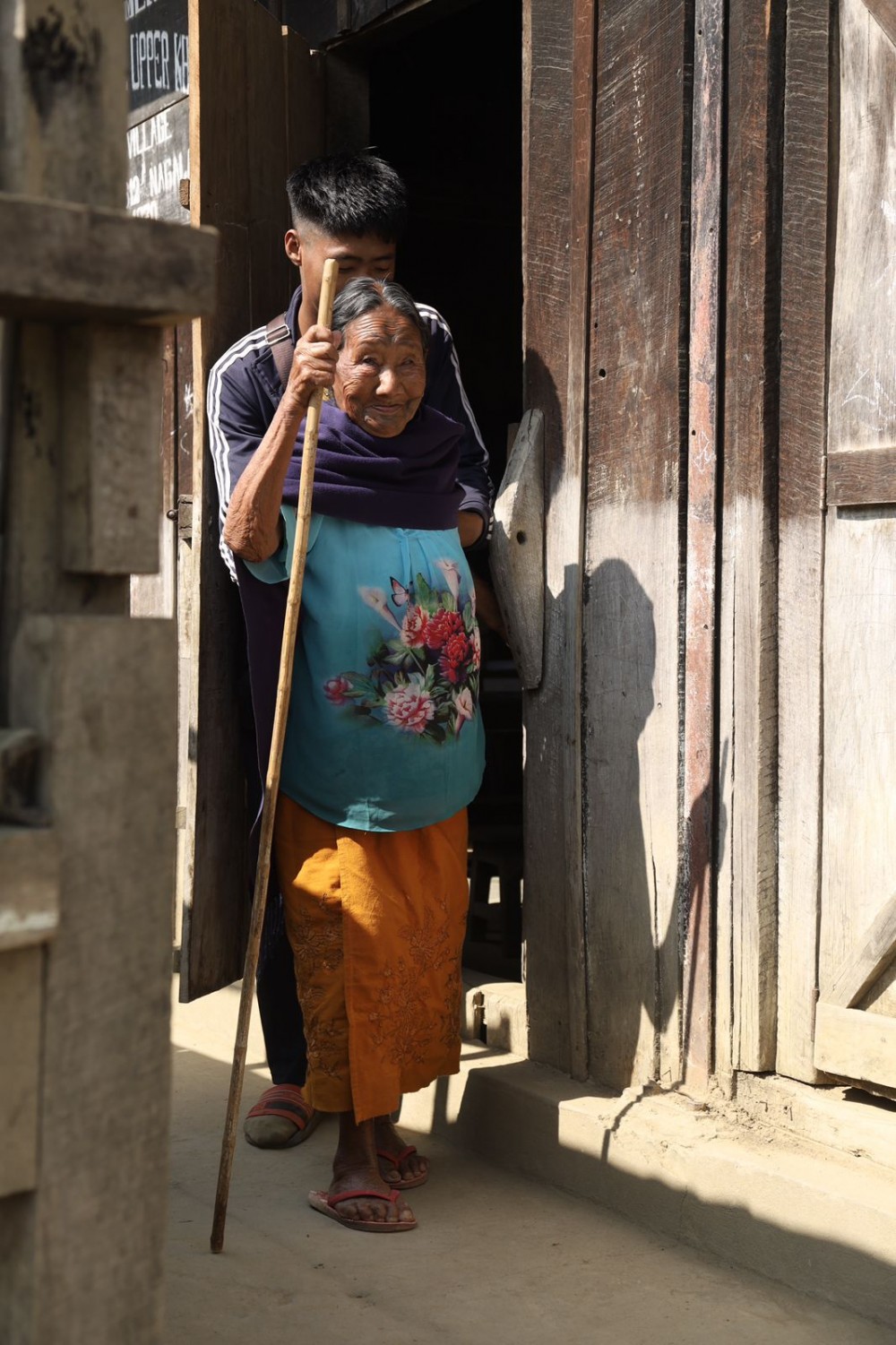 A senior citizen leaves the polling citizen after casting vote in Tuensang town on February 27. (Morung Photo)